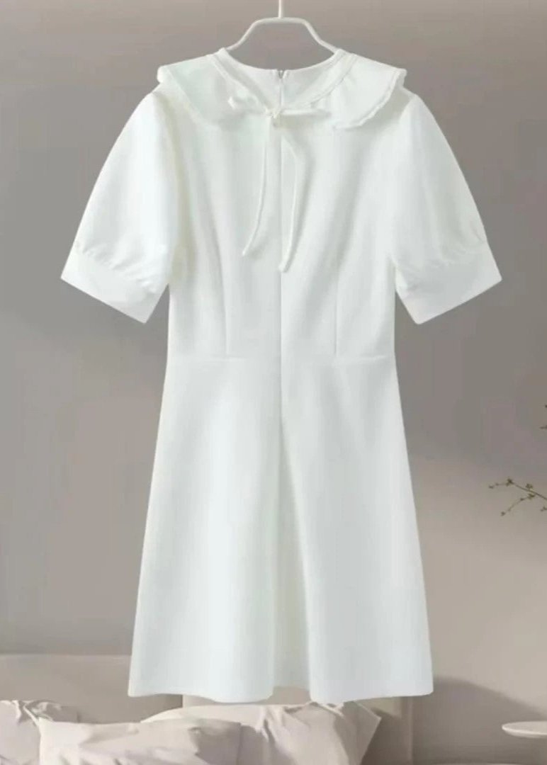 Amelie - Pearl Button Mini Dress