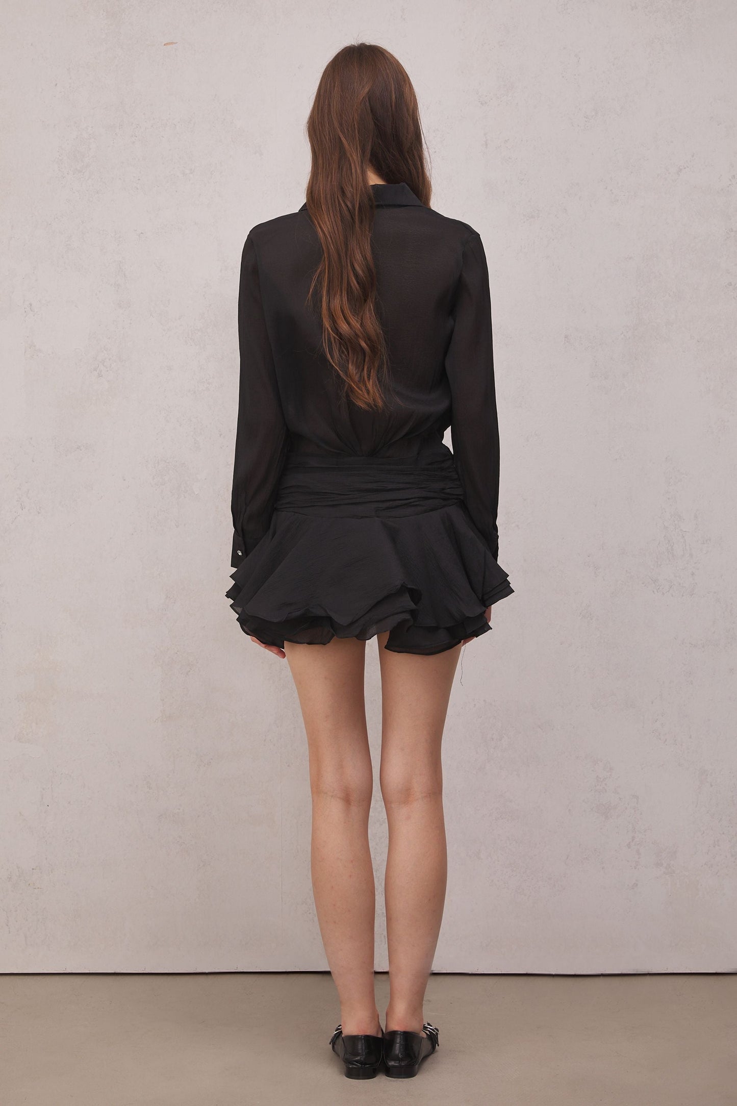Brinley Ruched Ruffle Mini Dress in Black