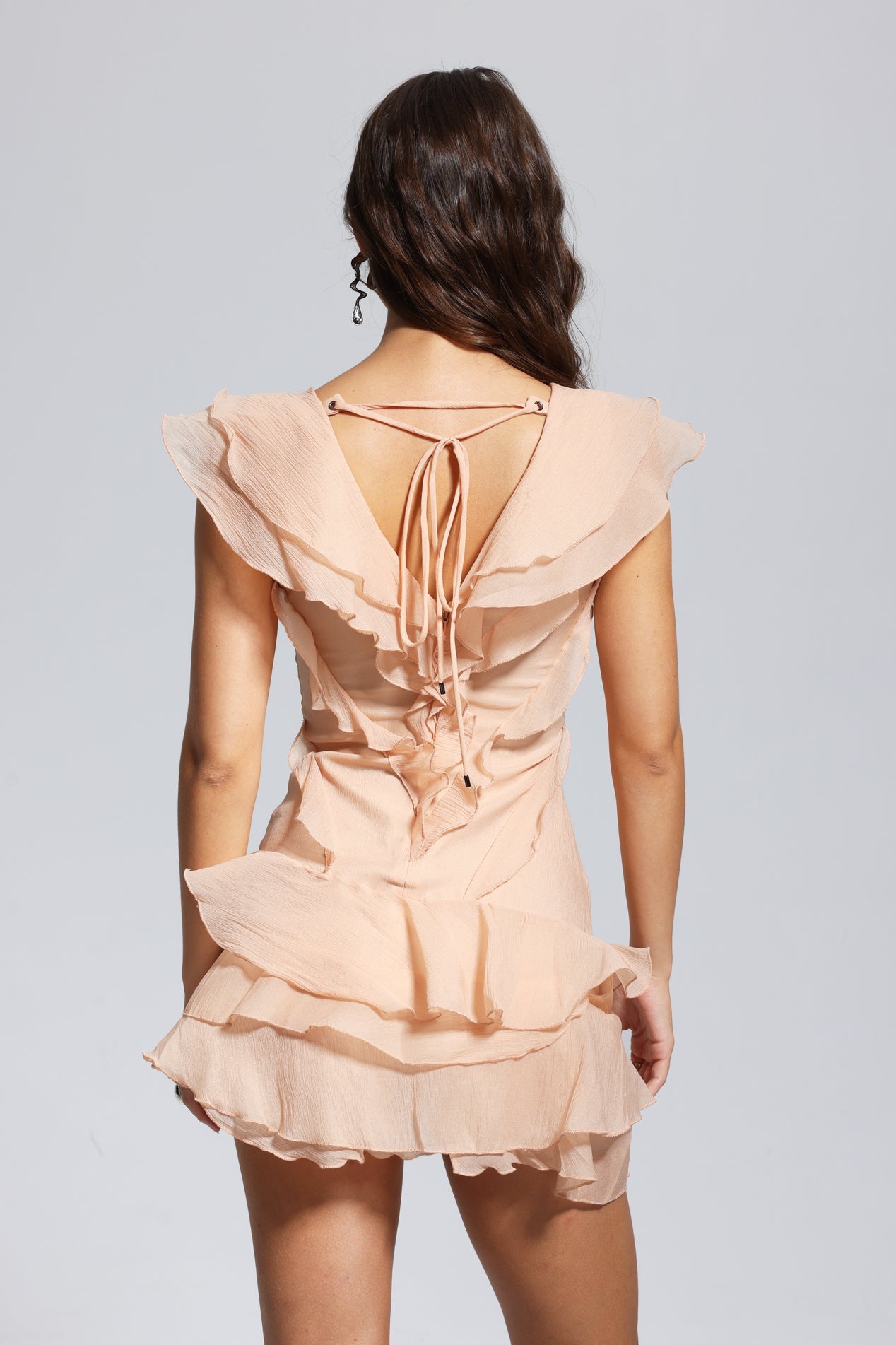 Maura V Neck Ruffle Asymmetric Mini Dress in Champagne