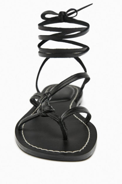 Strappy Flat Roman Sandals