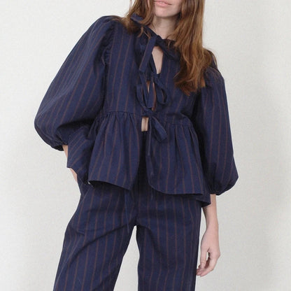 Puff Short Sleeve Peplum Tie Front Blouse