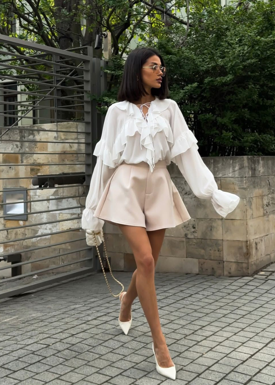 Isara - Ruffled Chiffon Blouse With Lace-up Neckline