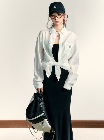 Classic White Long Sleeve Button-down Shirt: Crisp Cotton Collared Blouse With Embroidered Logo
